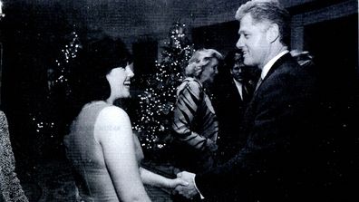 Monica Lewinsky meeting President Bill Clinton at a White House function.