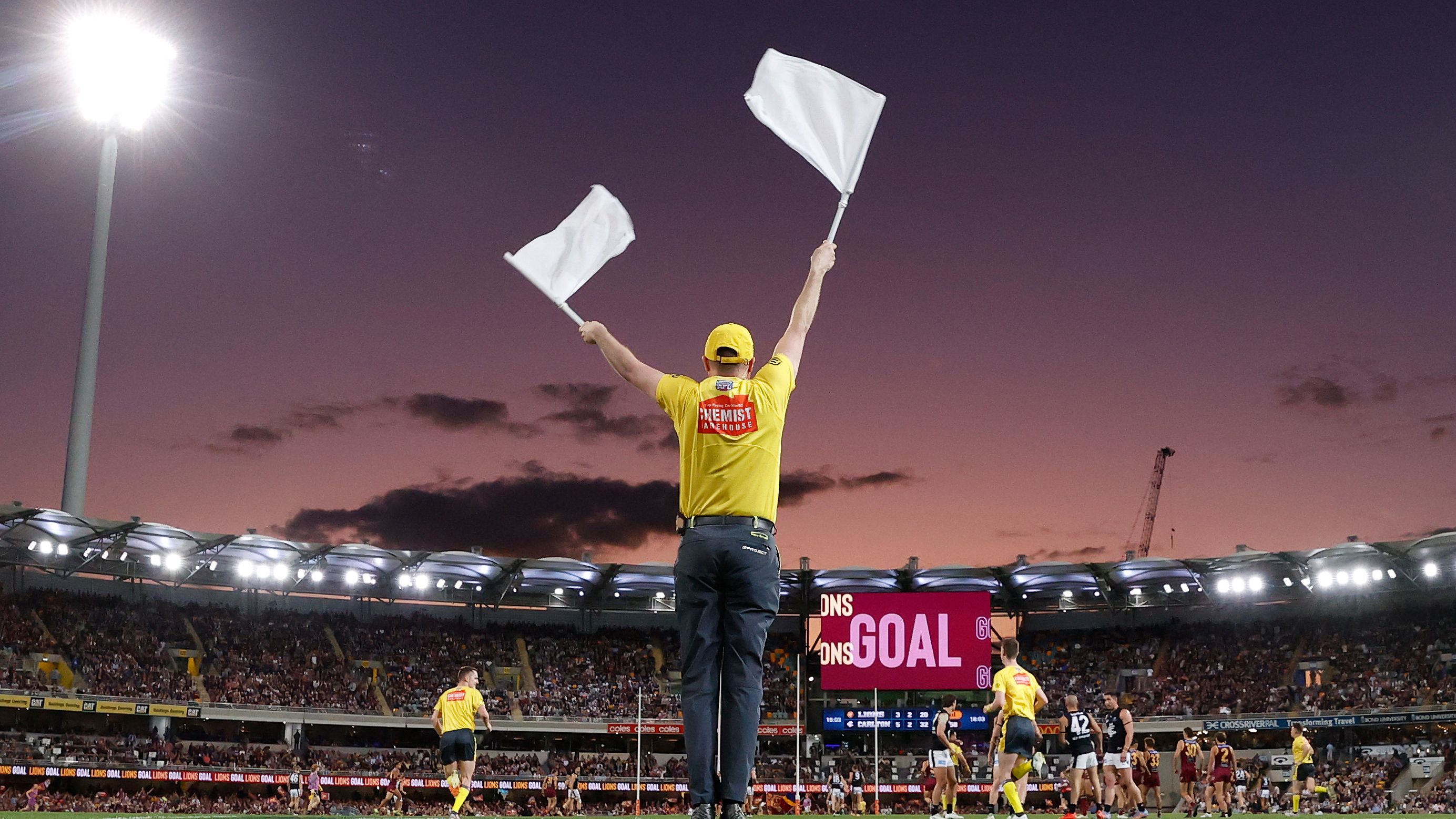 BRISBANE, AUSTRALIA - SEPTEMBER 23: The goal umpire waves his flags during the 2023 AFL Second Preliminary Final match between the Brisbane Lions and the Carlton Blues at The Gabba on September 23, 2023 in Brisbane, Australia. (Photo by Michael Willson/AFL Photos via Getty Images)