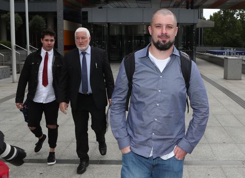 Neil Erikson (right) leaves the Federal Court in Melbourne yesterday. (AAP)