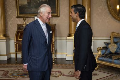 King Charles III welcomes Rishi Sunak during an audience at Buckingham Palace, London, where he invited the newly elected leader of the Conservative Party to become Prime Minister and form a new government, Tuesday, Oct. 25, 2022