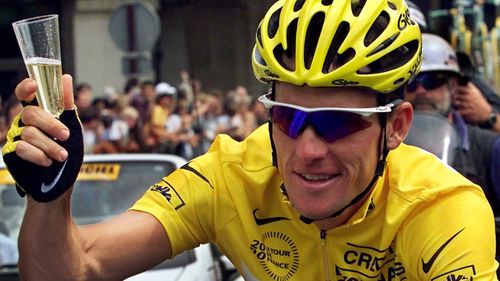 Lance Armstrong celebrates one of his seven wins in Le Tour de France before he was implicated in a wide-scale doping operation. (Getty) 