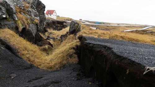 Cracks caused by volcanic activity emerge on a road in Grindavík, Iceland on November 11.