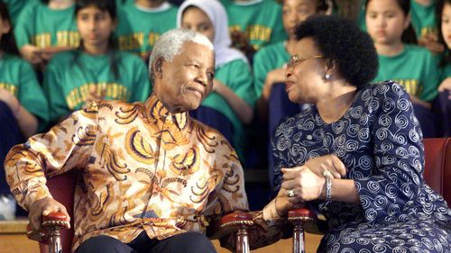 Mandela and his third wife, Graca Machel. Photo: AAP