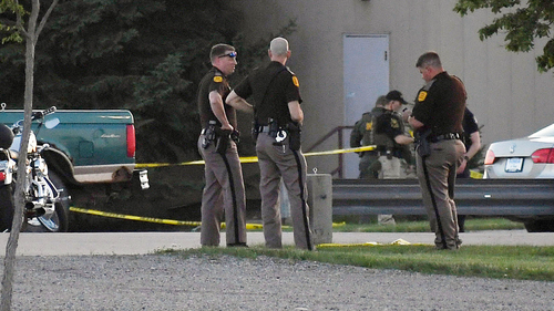Troopers from the Iowa State Patrol stand outside Cornerstone Church after a shooting on Thursday, June 2, 2022 in Ames, Iowa. 