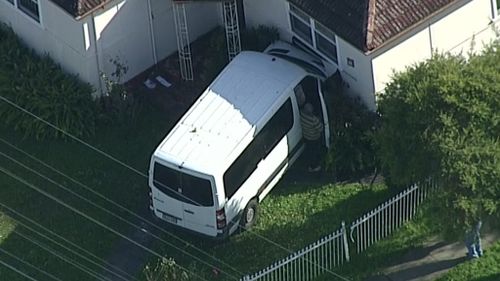 Two children and a man have been injured after a van crashed into a Fairfield Heights home. (9NEWS)