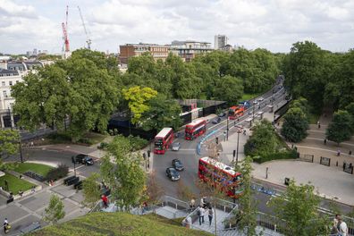 A view of Park Lane from the Marble Arch Mound in central London, a 25-metre high installation built to provide members of the public with sweeping views of Hyde Park, Mayfair and Marylebone. The deputy leader of Westminster council has resigned after the total costs for the mound nearly doubled to £6 million. Picture date: Friday August 13, 2021. PA Photo. The artificial hill, built on a scaffolding base with layers of soil and plywood forming the mound, opened to the public last month but was 