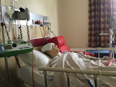 Natalie Diepenhorst in hospital during bowel cancer treatment.