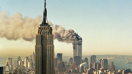 The twin towers of the World Trade Center burn behind the Empire State Building in New York, Tuesday, Sept. 11, 2001. (Andrew Knox/Facebook)