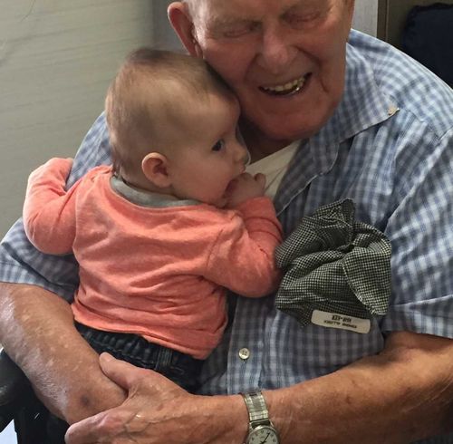 Mr Allcock, 108, met his great-great-grandson Esmond , who is named after him. (Jenna Lehne) 