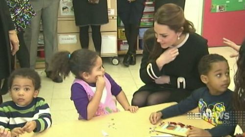 Catherine, Duchess of Cambridge, talks to children in Harlem. (9NEWS)