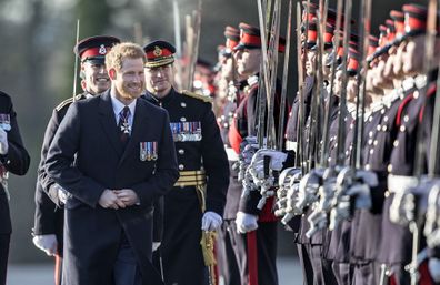 Prince Harry inspects the cadets during the Sovereign's Parade at The Royal Military Academy Sandhurst.