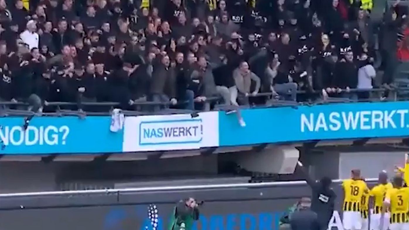Dutch fans forced to scramble to safety as grandstand gives way at football match