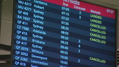 A departure and arrivals board at an airport reflects border closures across Australia, in reaction to the cluster outbreak at Sydney's Northern Beaches.