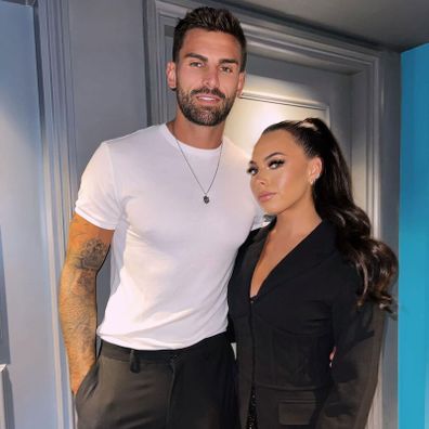 Love Island UK star Adam Collard denies 'cheating' on girlfriend Paige Thorne after a video of him with is arm around a mystery female went viral 