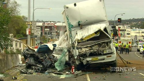 Police were forced to cut through the truck to get to some of the injured drivers. (9NEWS)