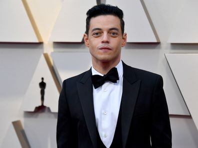 Rami Malek on the 2019 Oscars red carpet with a crooked bow-tie