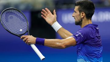 Novak Djokovic gestures during the first set of his US Open quarter-final against Matteo Berrettini.