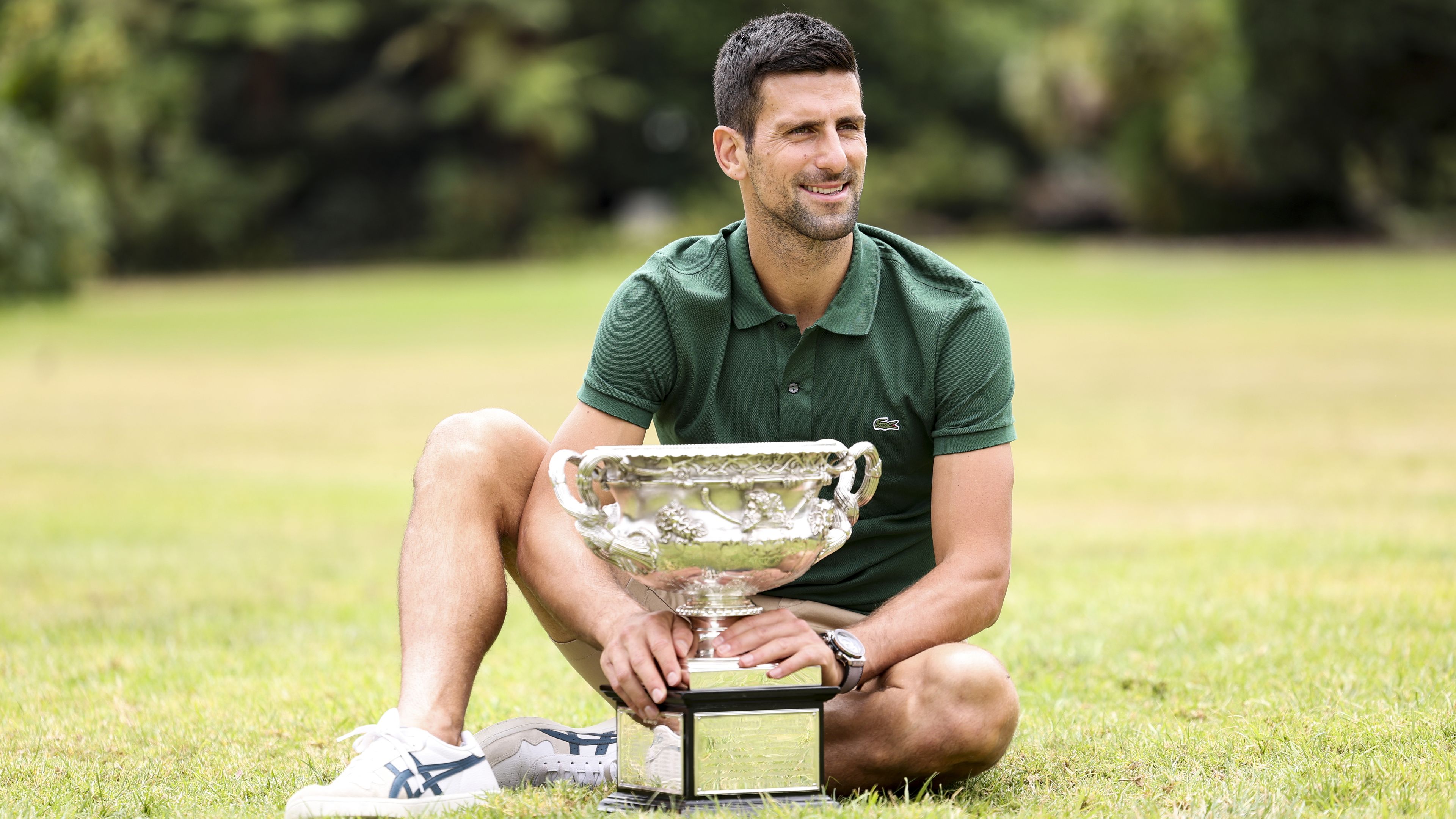 Novak Djokovic of Serbia poses with the Norman Brookes Challenge Cup after winning the 2023 Australian Open. (Photo by Lintao Zhang/Getty Images)
