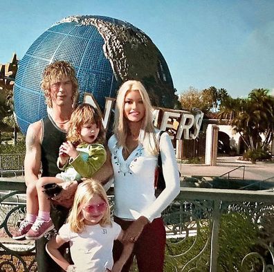 Susan Holmes and Duff McKagan with daughters Grace and Mae as children.