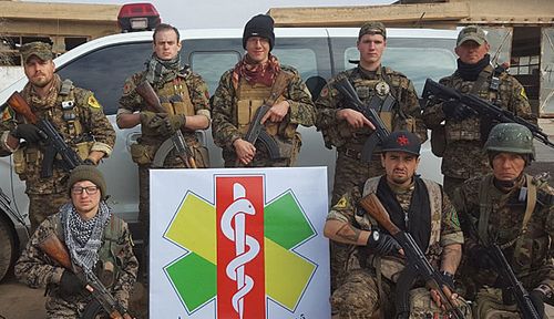 Lucas Chapman, (far left, front) and other international volunteers who joined the Kurdish militias. (Photo: Lucas Chapman).