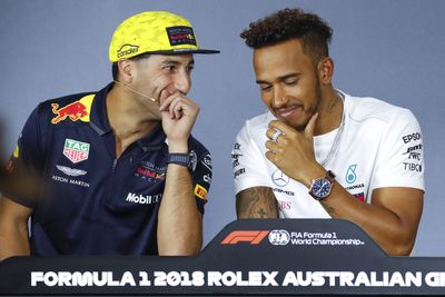 Daniel Ricciardo and Lewis Hamilton share a laugh at a press conference for the Grand Prix on Thursday night. (AAP)