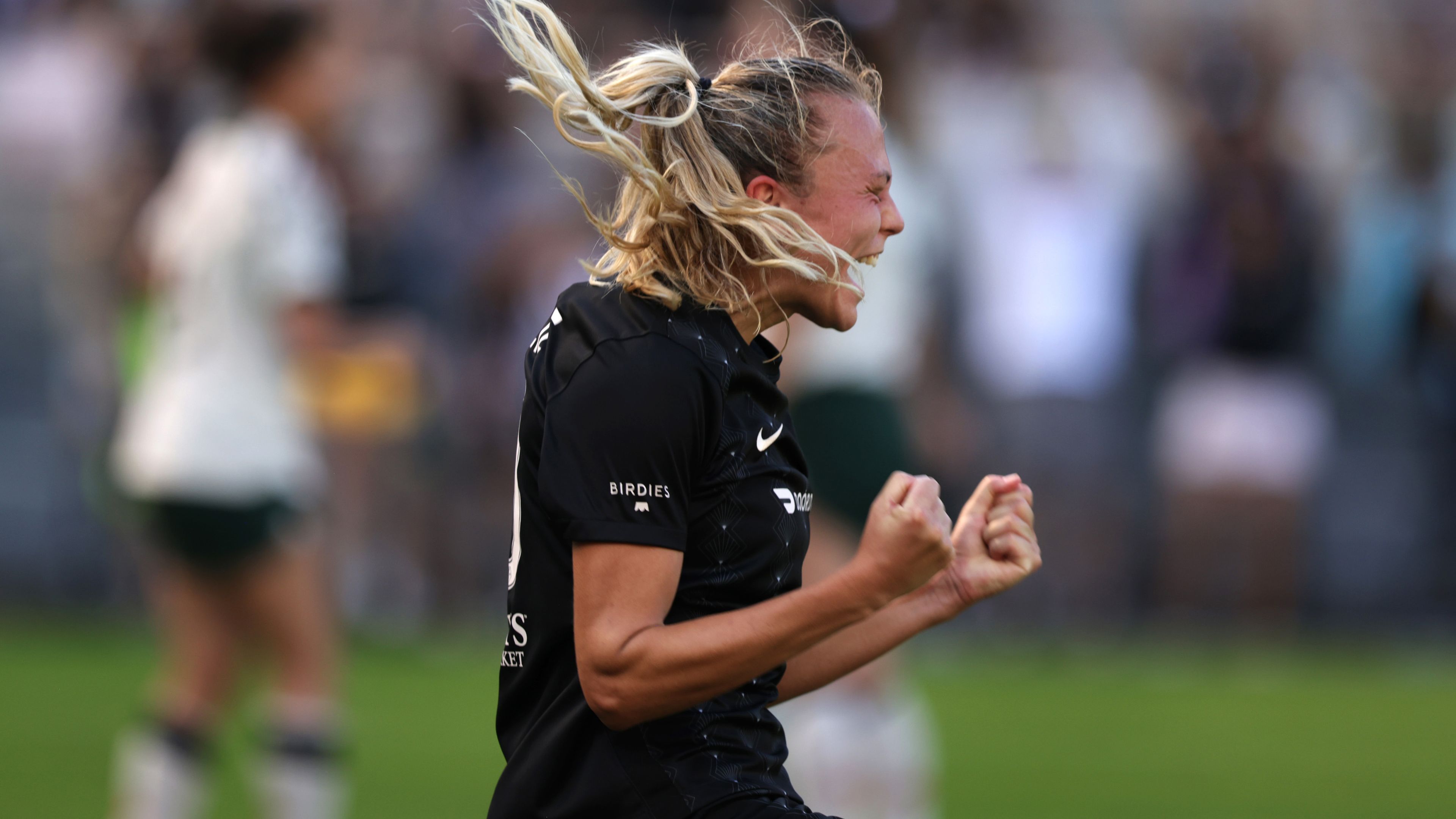 Claire Emslie #10 of Angel City FC celebrates after a goal in the first half of a game against the Portland Thorns at BMO Stadium on October 15, 2023 in Los Angeles, California. (Photo by Katharine Lotze/Getty Images)