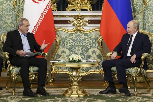Russian President Vladimir Putin  and Iranian President Masoud Pezeshkian 