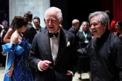 LONDON, UNITED KINGDOM - MAY 16:  Britain's King Charles III reacts next to Antonio Pappano, on the day of an event celebrating Antonio Pappano's 22 years as Music Director at the Royal Opera House on May 16, 2024 in London, England.   (Photo by Isabel Infantes-WPA Pool/Getty Images)