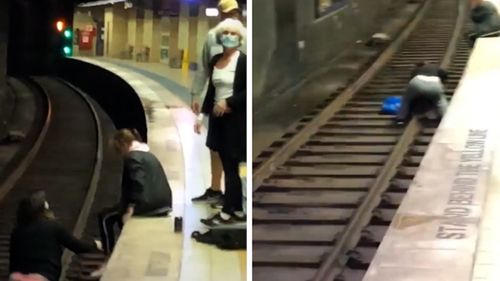 Sydney train nearly crashes into commuter who has called onto tracks.