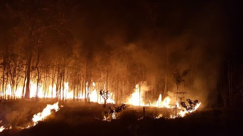 Strong winds and heatwave temperatures continue to hamper Queensland firefighting efforts as more than 110 blazes are still burning.