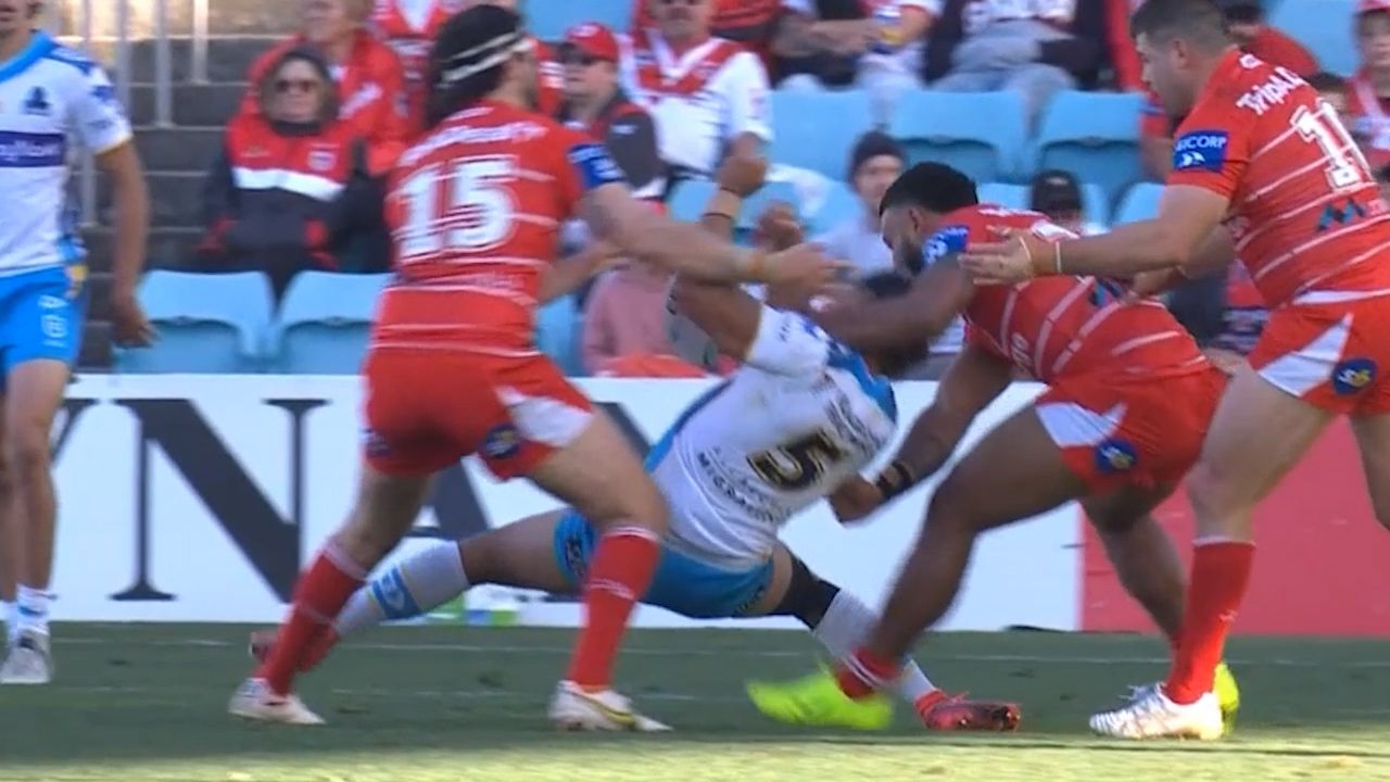 Dragons forward Francis Molo was sent off for this coathanger on Patrick Herbert.