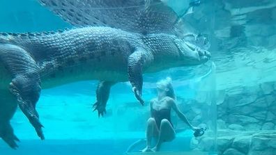 Lara Worthington goes swimming with crocodiles