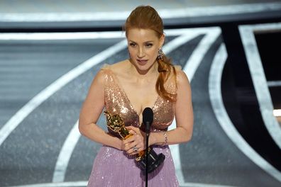 Jessica Chastain accepts the award for best performance by an actress in a leading role for "The Eyes of Tammy Faye" at the Oscars on Sunday, March 27, 2022, at the Dolby Theatre in Los Angeles. (AP Photo/Chris Pizzello)