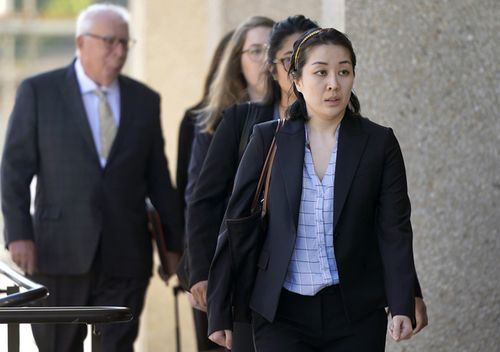 Tiffany Li arrives at the courthouse in Redwood City, California. The trial of Li, a Chinese real estate scion who posted a $51 million bail after being charged with orchestrating the 2016 murder of her children's father, began this week.