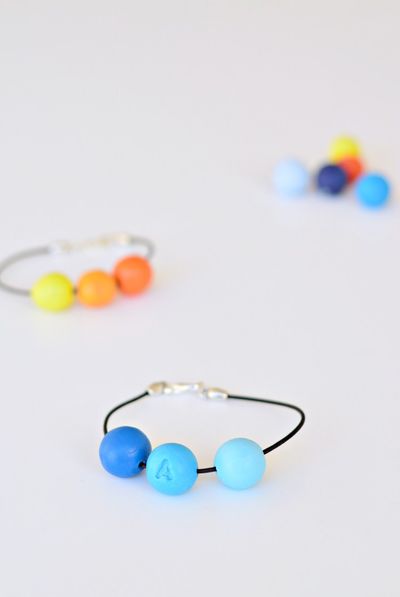 <p>Alphabet bracelets</p>
<p>These darling little bracelets suit boys and girls. Made with clay beads and leather cord, they are a little trickier in the craft stakes - but worth it. You can personalise them with each guest's initial. <a href="https://yourdiyfamily.com/2016/11/celebrate-friendships-with-these-diy-personalised-bracelets/" target="_blank">Here's how to make them ...</a></p>