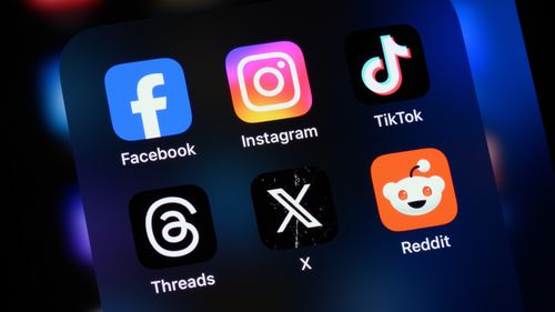 Toronto, Canada - August 22, 2024:    Popular social media apps on an Apple iPhone: Facebook, Instagram, TikTok, Threads, X (formerly Twitter), and Reddit.