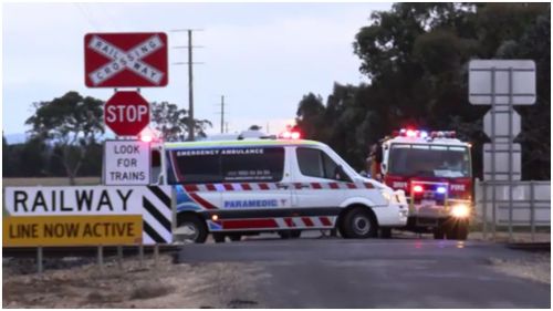 The man's car collided with the train on Power Station Road. (9NEWS)
