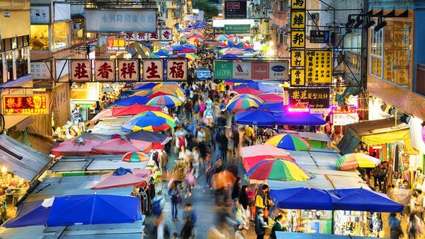 Colourful umbrellas line the streets at Hong Kong's wet markets