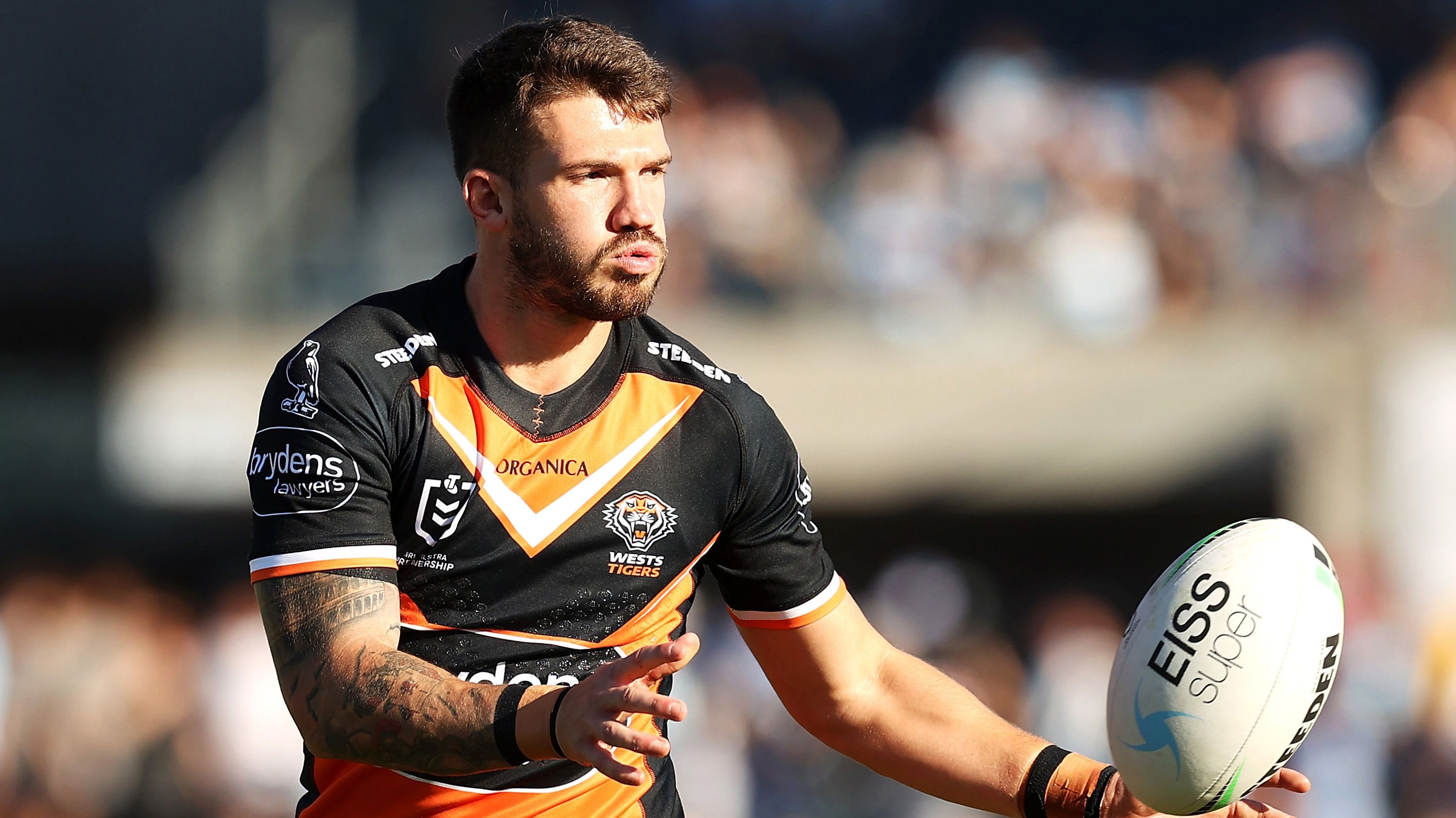 Oliver Gildart of the Tigers during the warm-up before ther clash against the Sharks in April. Photo: Mark Kolbe