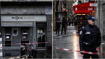 A group of armed men are on the run after a daring bank robbery on the Champs Elysees in Paris, France yesterday.