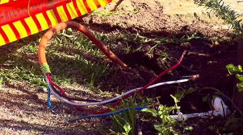 An illegal electrical cord was allegedly used to bypass the meter box.