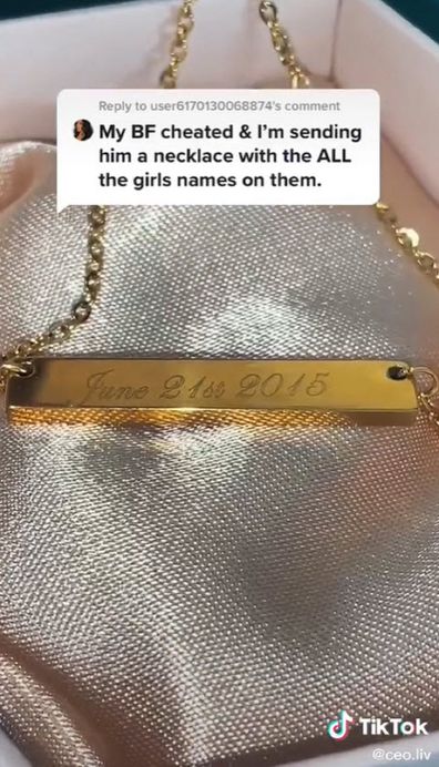 On the flip side of the necklace is the date of their anniversary.