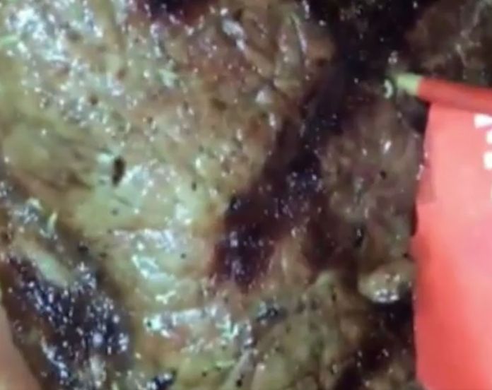 VIDEO: This video of a steak 'full of worms' may put you off your lunch 