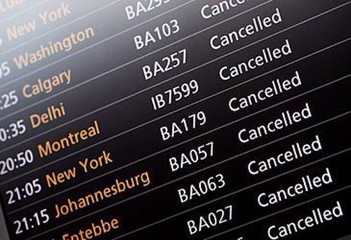 The flight information screen shows cancellations at Heathrow Airport in 2010 (OLI Scarff/Getty)