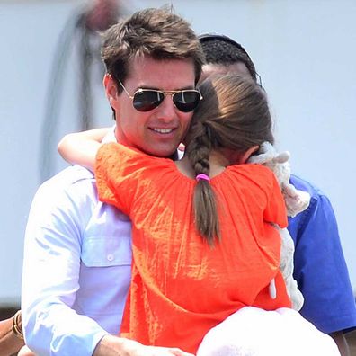 Tom Cruise and Suri Cruise leave Manhattan by helicopter at the West Side Heliport on July 18, 2012.