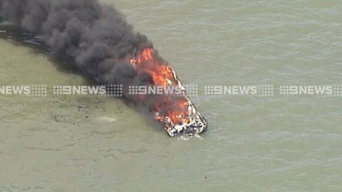 The boat caught fire off Wellington Point. (9NEWS)