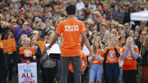 Students across the nation stopped for 17 minutes to honour the victims of a shooting at Marjory Stoneman Douglas High School in Florida last month (AAP).