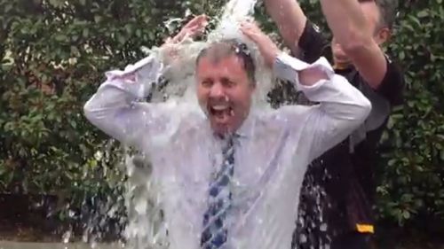 Victorian MP Josh Frydenberg completes the ice bucket challenge. (YouTube)