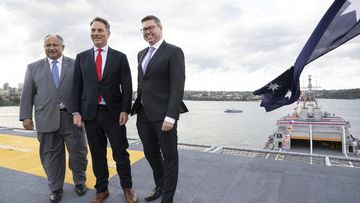 US Secretary of the Navy, Carlos Del Toro, Deputy Prime Minister Richard Marles and Minister for Defence Industry, Pat Conway, at the launch of the bilateral military exercise, Talisman Sabre, on the HMAS Canberra on Garden Island, Sydney. July 21, 2023 Photo: Janie Barrett