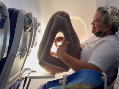The passenger also used an oversized plane pillow on the flight.